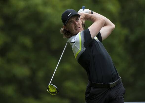 24.05.2015. Wentworth, England. BMW PGA Golf Herren Golf Championship. Final Round. Tommy Fleetwood ENG starts the day three shots off the lead. Tee shot 3rd hole during the final round of the 2015 BMW PGA Championship from The West Course Wentworth Golf Club xStephenxBartholomewx  ActionPlus11623493