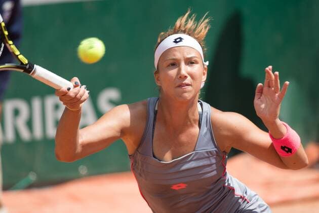 May 25, 2015: Paula Kania (POL) in action in a 1st round match against Mona Barthel (GER) on day two of the 2015 French Open tennis tournament at Roland Garros in Paris, France. Kania won 57 62 64. Sydney Low Cal Media. Tennis 2015: French Open MAY 25 - ZUMAc04_