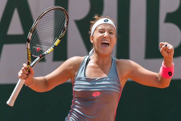 May 25, 2015: Paula Kania (POL) celebrates her win in a 1st round match against Mona Barthel (GER) on day two of the 2015 French Open tennis tournament at Roland Garros in Paris, France. Kania won 57 62 64. Sydney Low Cal Media. Tennis 2015: French Open MAY 25 - ZUMAc04_