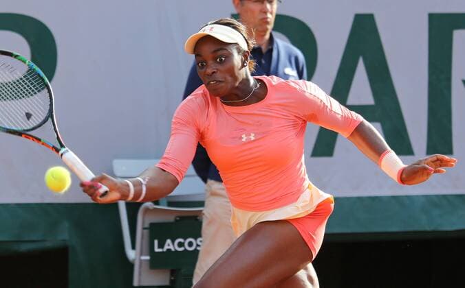 American Sloane Stephens hits a shot during her French Open women s first round match against American Venus Williams at Roland Garros in Paris on May 25, 2015. Stephens defeated Williams 7-6 (5), 6-1 to advance to the next round.  PAR20150525711 DAVIDxSILPA