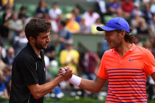 Lucas Pouille (FRA) Gilles Simon (FRA) TENNIS : Roland Garros 2015 - Internationaux de France - 25 05 2015 TennisMagazine Panoramic 