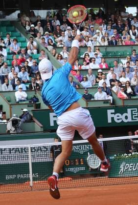 Facundo Arguello of Argentina hits a shot during his French Open men s first round match against Andy Murray of Great Britain at Roland Garros in Paris on May 25, 2015. Murray defeated Arguello 6-3, 6-3, 6-1 to advance to the second round.  PAR20150525722 DAVIDxSILPA