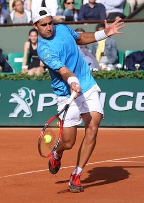 Facundo Arguello of Argentina hits a shot during his French Open men s first round match against Andy Murray of Great Britain at Roland Garros in Paris on May 25, 2015. Murray defeated Arguello 6-3, 6-3, 6-1 to advance to the second round.  PAR20150525730 DAVIDxSILPA