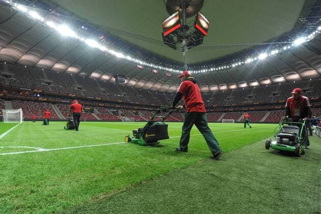 May 26, 2015 - Naples, Italy - Groundsmen prepare the pitch on the eve of the the UEFA Europa League Final match between FC Dnipro Dnipropetrovsk and Sevilla Football Soccer at Stadion Narodowy on May 26, 2015 in Warsaw, Poland. Sevilla FC Training - UEFA Europa League Final  - ZUMAn230