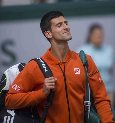 (150527) -- PARIS, May 26, 2015 -- Novak Djokovic of Serbia reacts before the men s singles first round match against Jarkko Nieminen of Finland at 2015 French Open tennis tournament at Roland Garros, in Paris, France on May 26, 2015. Novak Djokovic won 3-0. )(lm) (SP)FRANCE-PARIS-TENNIS-OPEN ChenxXiaowei 