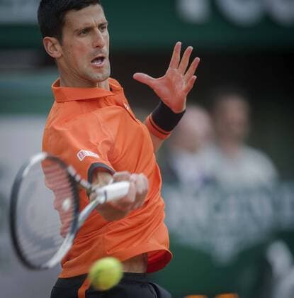 (150527) -- PARIS, May 26, 2015 -- Novak Djokovic of Serbia hits a return during the men s singles first round match against Jarkko Nieminen of Finland at 2015 French Open tennis tournament at Roland Garros, in Paris, France on May 26, 2015. Novak Djokovic won 3-0. )(lm) (SP)FRANCE-PARIS-TENNIS-OPEN ChenxXiaowei 