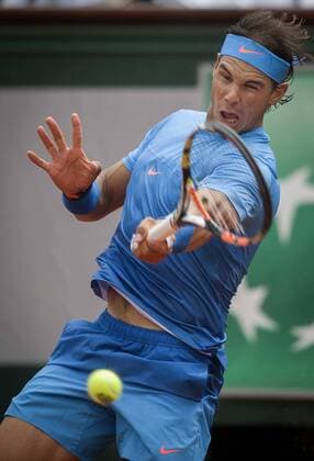 (150527) -- PARIS, May 26, 2015 -- Rafael Nadal of Spain competes during the men s singles first round match against Quentin Halys of France at 2015 French Open tennis tournament at Roland Garros, in Paris, France on May 26, 2015. Nadal won 3-0. ) (SP)FRANCE-PARIS-TENNIS ChenxXiaowei 