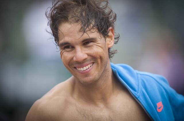 (150527) -- PARIS, May 26, 2015 -- Rafael Nadal of Spain reacts after the men s singles first round match against Quentin Halys of France at 2015 French Open tennis tournament at Roland Garros, in Paris, France on May 26, 2015. Nadal won 3-0. ) (SP)FRANCE-PARIS-TENNIS ChenxXiaowei 