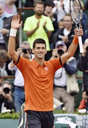 Djokovic through to French Open 2nd round Novak Djokovic of Serbia acknowledges the cheers of fans after defeating Jarkko Nieminen of Finland 6-2, 7-5, 6-2 in a first-round match at the French Open tennis tournament in Paris on May 26, 2015. 