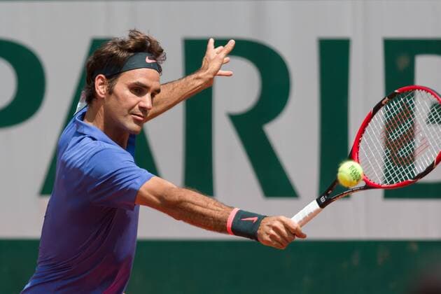 Roger Federer of Switzerland in action in a 2nd round match against Marcel Granollers of Spain on day three of the 2015 French Open tennis tournament at Roland Garros in Paris, France. Sydney Low Cal Media. Tennis 2015: French Open MAY 27 - ZUMAc04_