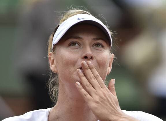 Sharapova advances to French Open 3rd round Russia s Maria Sharapova throws a kiss to the audience after defeating Vitalia Diatchenko, also from Russia, 6-3, 6-1 during a French Open second-round match in Paris on May 27, 2015. 
