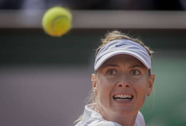 (150527) -- PARIS, May 27, 2015 -- Maria Sharapova of Russia competes during the women s singles second round match against her compatriot Vitalia Diatchenko at 2015 French Open tennis tournament at Roland Garros, in Paris, France on May 27, 2015. Sharapova won 2-0. ) (SP) FRANCE-PARIS-TENNIS-FRENCH OPEN-DAY 4 ChenxXiaowei 