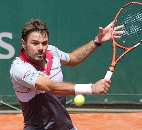 Stan Wawrinka of Switzerland hits a shot during his French Open men s second round match against Dusan Lajovic of Serbia and Montenegro at Roland Garros in Paris on May 27, 2015. Wawrinka defeated Lajovic 6-3, 6-4, 5-7, 6-3 to advance to the next round.  PAR20150527724 DAVIDxSILPA