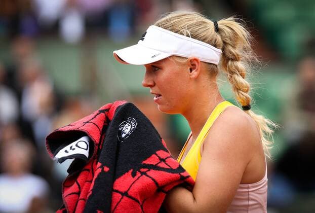 - PARIS, FRANCE: Danish Caroline Wozniacki looks dejected at a tennis match against German Julia Goerges in round 2 of the women s singles at the Roland Garros tennis tournament, in Paris, France, Thursday 28 May 2015. Roland Garros Grand Slam takes place from 24 May to 07 June 2015. VIRGINIExLEFOUR  x04632036x