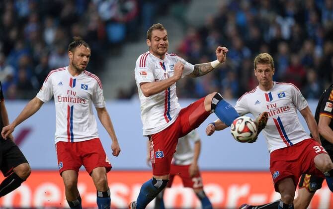 FUSSBALL 1. BUNDESLIGA SAISON 2014 2015 RELEGATION HINSPIEL Hamburger SV - Karlsruher SC 28.05.2015 Ohne Gegner: Heiko Westermann, Pierre-Michel Lasogga und Slobodan Rajkovic (v.l., alle Hamburger SV) 