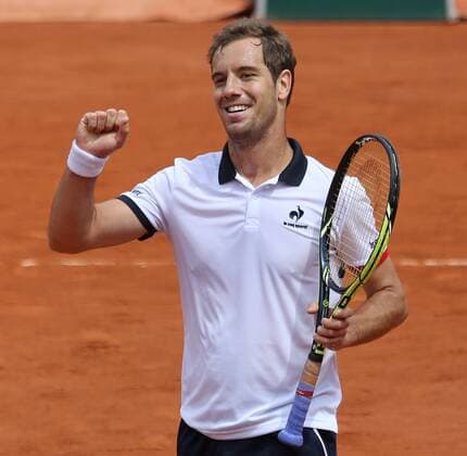 Richard Gasquet of France reacts after winning his French Open men s second round match against Carlos Berlocq of Argentina at Roland Garros in Paris on May 29, 2015. Gasquet defeated Berlocq 3-6, 6-3, 6-1, 4-6, 6-1 to advance to the next round.  PAR20150529718 DAVIDxSILPA