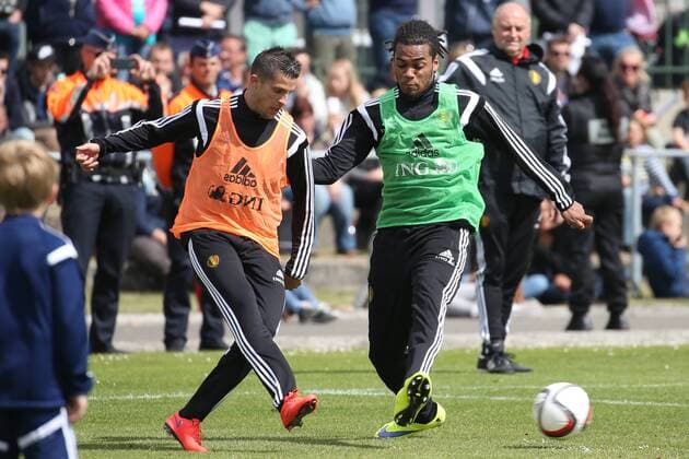 - KNOKKE-HEIST, BELGIUM: Belgium s Kevin Mirallas and Belgium s Jason Denayer fight for the ball during a training session on the third day of the training camp of Belgian national soccer team The Red Devils in Knokke-Heist, Saturday 30 May 2015. The Devils are preparing for a friendly game against France and a Euro 2016 qualification game against Wales. BRUNOxFAHY  x04633409x