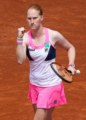 - PARIS, FRANCE: Belgian Alison Van Uytvanck celebrates during a tennis match between Belgian Alison Van Uytvanck and French Kristina Mladenovic in round 3 of the women s singles at the Roland Garros French Open tennis tournament, in Paris, France, Saturday 30 May 2015. The Roland Garros Grand Slam takes place from 24 May to 07 June 2015. VIRGINIExLEFOUR  x04633520x