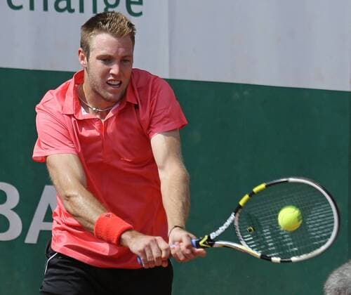 American Jack Sock hits a shot during his French Open men s third round match against Borna Coric of Croatia at Roland Garros in Paris on May 30, 2015. Sock defeated Coric 6-2, 6-1, 6-4 to advance to the next round.  PAR20150530737 DAVIDxSILPA