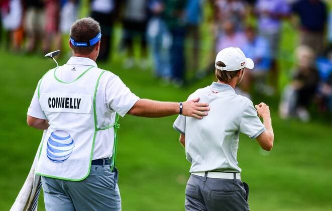 May 30, 2015: Austin Connelly gets a pat on the back from caddie after his par putt on 1 during third round play of the AT&T Byron Nelson Championship at TPC Four Seasons in Irving, Texas. GOLF: MAY 30 PGA Golf Herren - AT&T Byron Nelson Championship - Third Round Icon1505300163 EDITORIAL USE ONLY