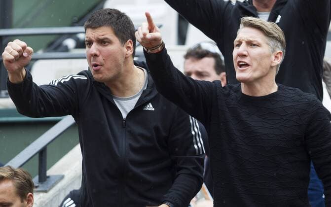 TENNIS - WTA Tennis Damen French Open 2015 PARIS,FRANCE,31.MAY.15 - TENNIS - WTA World Tour, Grand Slam, Roland Garros, French Open. Image shows Zlatko Novkovic and Bastian Schweinsteiger (Bayern). GEPAxpictures xMatthiasxHauer