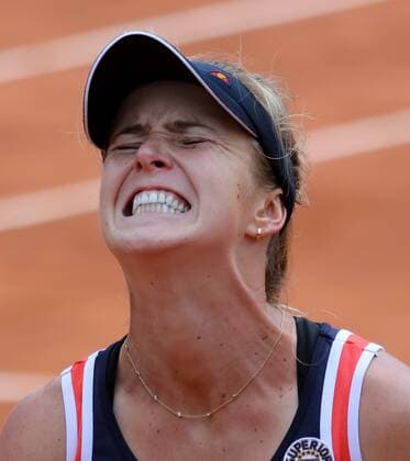 Elina Svitolina of Ukraine reacts after a shot during her French Open women s fourth round match against Alize Cornet of France at Roland Garros in Paris on May 31, 2015. Svitolina defeated Cornet 6-2, 7-6 (9) to advance to the next round.  PAR20150531706 DAVIDxSILPA