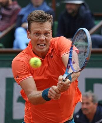 Tomas Berdych of the Czech Republic hits a shot during his French Open men s fourth round match against Jo-Wilfried Tsonga of France at Roland Garros in Paris on May 31, 2015. Tsonga defeated Berdych 6-3, 6-2, 6-7 (5), 6-3 to advance to the next round.  PAR20150531731 DAVIDxSILPA