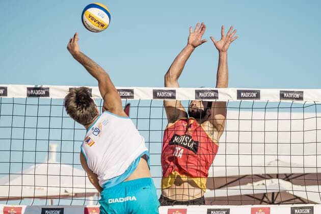 May 31, 2015 - Barcelona, Catalonia, Spain - Italy s MATTEO CECCHINI blocks against Marco Caminati during the male final at the 12th City of Barcelona International Beach volleyball Beachvolleyball Tournament - Italian duo Marco Caminati Enrico Rossi beat Italy s Matteo Cecchini Matteo Martino 2:0 in the final competition Winners of the 12th City of Barcelona International Beach Volleyball Tournament announced - ZUMAo105
