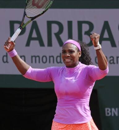 American Serena Williams reacts after winning her French Open women s fourth round match against American Sloane Stephens at Roland Garros in Paris on June 1, 2015. Williams defeated Stephens 1-6, 7-5, 6-3 to advance to the next round.  PAR20150601755 DAVIDxSILPA