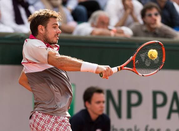 02.06.2015. Roland Garros, Paris, France. Stan Wawrinka of Switzerland in action against Roger Federer of Switzerland during their Men s Singles match on day ten of the 2015 French Open 2015 in Paris, France. Wawrinka won the match 6-4 6-3 7-6 to move into the semi finals xBenxPipex  ActionPlus11627064