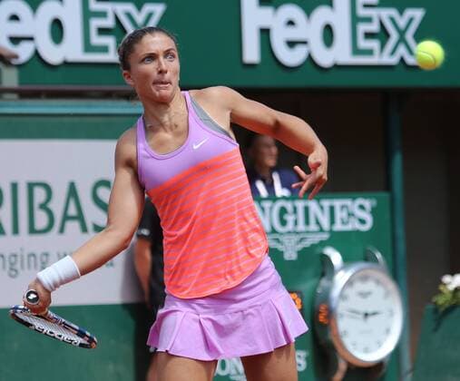 Sara Errani of Italy hits a shot during her French Open women s quarterfinal match against American Serena Williams at Roland Garros in Paris on June 3, 2015. Williams defeated Errani 6-1, 6-3 to advance to the next round.  PAR20150603701 DAVIDxSILPA