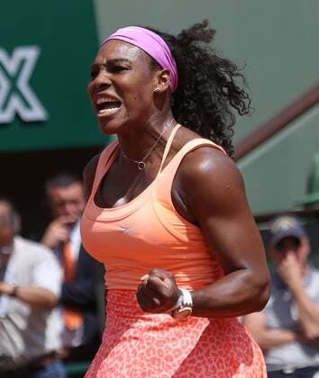 American Serena Williams reacts after a shot during her French Open women s quarterfinal match against Sara Errani of Italy at Roland Garros in Paris on June 3, 2015. Williams defeated Errani 6-1, 6-3 to advance to the next round.  PAR20150603707 DAVIDxSILPA