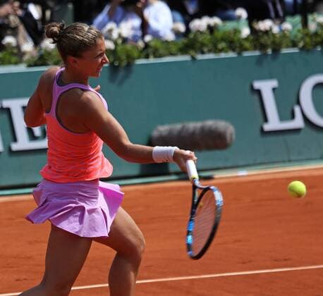 Sara Errani of Italy hits a shot during her French Open women s quarterfinal match against American Serena Williams at Roland Garros in Paris on June 3, 2015. Williams defeated Errani 6-1, 6-3 to advance to the next round.  PAR20150603710 DAVIDxSILPA