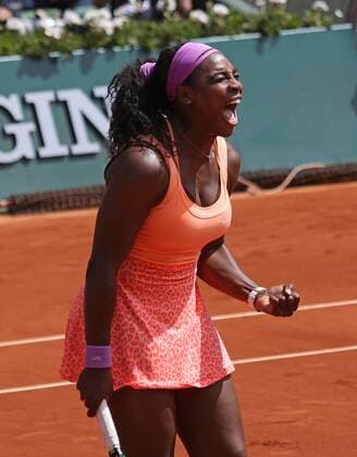American Serena Williams reacts after winning her French Open women s quarterfinal match against Sara Errani of Italy at Roland Garros in Paris on June 3, 2015. Williams defeated Errani 6-1, 6-3 to advance to the next round.  PAR20150603715 DAVIDxSILPA
