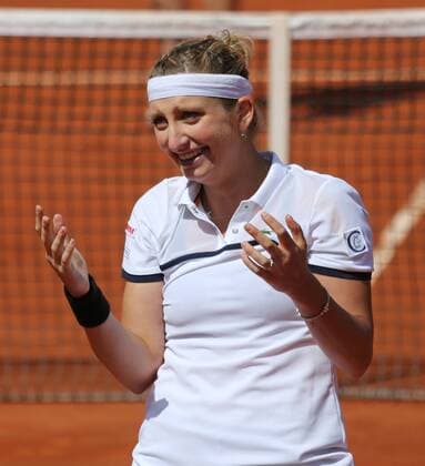 Timea Bacsinszky of Switzerland reacts after winning her French Open women s quarterfinal match against Alison Van Uytvanck of Belgium at Roland Garros in Paris on June 3, 2015. Bacsinszky defeated Van Uytvanck 6-4, 7-5 to advance to the next round.  PAR20150603729 DAVIDxSILPA