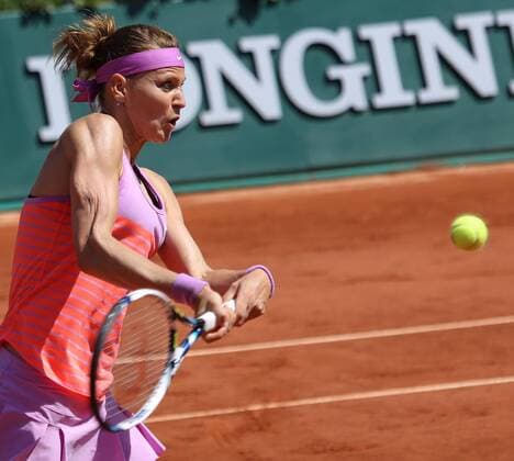 Lucie Safarova of the Czech Republic hits a shot during her French Open women s semifinal match against Ana Ivanovic of Serbia at Roland Garros in Paris on June 4, 2015.  PAR20150604710 DAVIDxSILPA