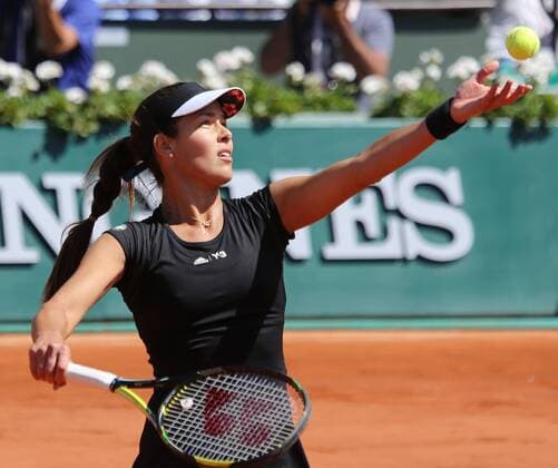 Ana Ivanovic of Serbia hits a serve during her French Open women s semifinal match against Lucie Safarova of the Czech Republic at Roland Garros in Paris on June 4, 2015.  PAR20150604708 DAVIDxSILPA