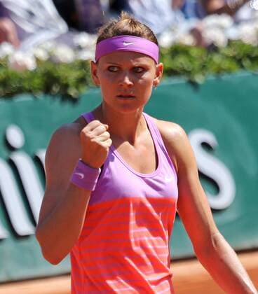 Lucie Safarova of the Czech Republic reacts after a shot during her French Open women s semifinal match against Ana Ivanovic of Serbia at Roland Garros in Paris on June 4, 2015.  PAR20150604709 DAVIDxSILPA