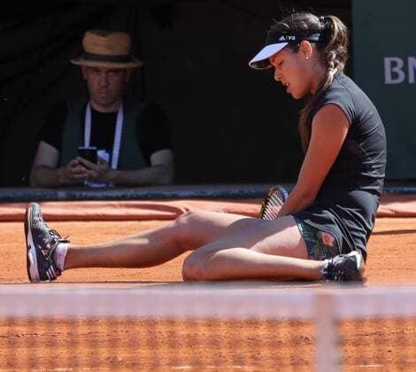 Ana Ivanovic of Serbia falls during her French Open women s semifinal match against Lucie Safarova of the Czech Republic at Roland Garros in Paris on June 4, 2015. Ivanovic defeated Safarova 6-1, 6-3 to advance to the finals.  PAR20150604720 DAVIDxSILPA