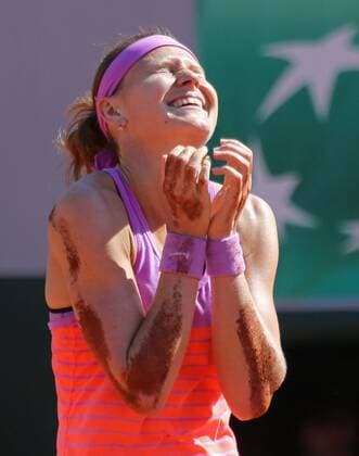 Lucie Safarova of the Czech Republic reacts after winning her French Open women s semifinal match against Ana Ivanovic of Serbia at Roland Garros in Paris on June 4, 2015. Ivanovic defeated Safarova 6-1, 6-3 to advance to the finals.  PAR20150604729 DAVIDxSILPA