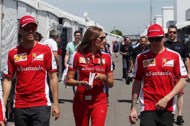 Canadian Grand Prix, Montreal 4 - 7 June 2015 04.06.2015 - (L-R) Sebastian Vettel (GER) Scuderia Ferrari SF15-T, Stefania Boccoli, Press Office Ferrari and Kimi Raikkonen (FIN) Scuderia Ferrari SF15-T 