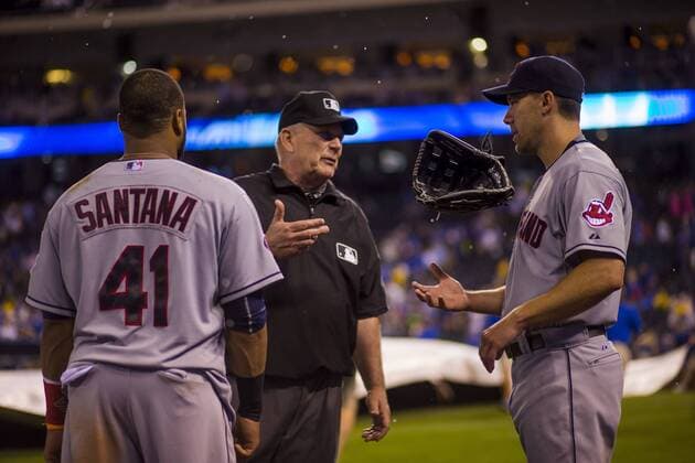 June 04, 2015: Carlos Santana 41 and Michael Bourn 24 of the Cleveland Indians discuss the rain delay with an umpire during the MLB Baseball Herren USA game between the Cleveland Indians and the Kansas City Royals at Kauffman Stadium in Kansas City, MO. Kyle Rivas CSM MLB 2015: Indians vs Royals JUN 04 - ZUMAc04_