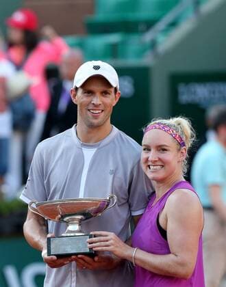 Bethanie Mattek-Sands (R) and Mike Bryan of the United States pose with the champion trophy during the awarding ceremony for the mixded doubles final at 2015 French Open tennis tournament in Paris, France on June 4, 2015. The U.S. pair claimed the title of the event after beating Lucie Hradecka of the Czech Republic and Marcin Matkowski of Poland 2-0. ) (SP)FRANCE-PARIS-TENNIS-FRENCH OPEN 2015-MIXED DOUBLES-FINAL HanxYan 