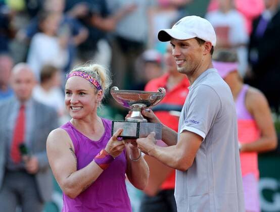 Bethanie Mattek-Sands (L) and Mike Bryan of the United States hold the champion trophy during the awarding ceremony for the mixded doubles final at 2015 French Open tennis tournament in Paris, France on June 4, 2015. The U.S. pair claimed the title of the event after beating Lucie Hradecka of the Czech Republic and Marcin Matkowski of Poland 2-0. ) (SP)FRANCE-PARIS-TENNIS-FRENCH OPEN 2015-MIXED DOUBLES-FINAL HanxYan 