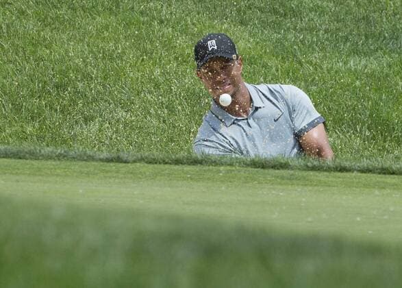 June 05 2015: Tiger Woods hitting from the bunker during the second round of the Memorial Tournament held at the Muirfield Village Golf Club in Dublin, Ohio. GOLF: JUN 05 PGA Golf Herren - the Memorial Tournament - Second Round Icon150605052 EDITORIAL USE ONLY