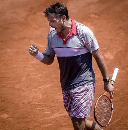 Stan Wawrinka of Switzerland reacts during the men s singles semifinal against Jo-Wilfried Tsonga of France at 2015 French Open tennis tournament at Roland Garros in Paris June 5, 2015. Wawrinka won 3-1 and advanced to the final. ) (SP)FRANCE-PARIS-TENNIS-FRENCH OPEN ChenxXiaowei 