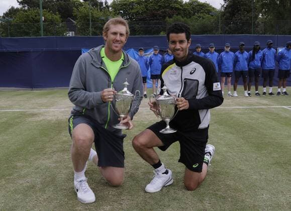 06.06.2015. Manchester, England. Aegon Manchester Trophy. Chris Guccione (AUS) and Andre Sa (BRA) pose with their men s doubles trophy. Their scheduled opponents in the final Raven Klaasen (RSA) and Rajeev Ram (USA) withdrew after Ram was injured in his men s singles sem-final against Sam Groth. xAlanxMartinx  ActionPlus11628308