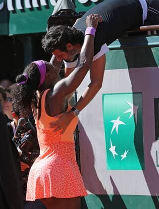 American Serena Williams hugs coach Patrick Mouratoglou after winning her French Open women s final match against Lucie Safarova of the Czech Republic at Roland Garros in Paris on June 6, 2015. Williams defeated Safarova 6-3, 6-7 (2), 6-2 to win her third French Open title.  PAR20150606727 DAVIDxSILPA