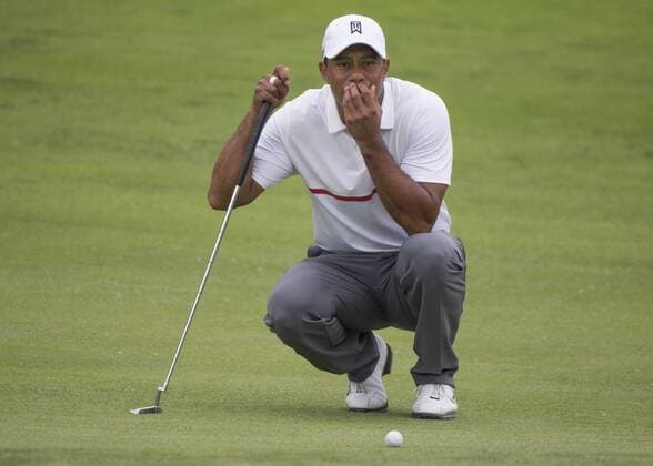 June 06 2015: Tiger Woods preparing to putt the ball during the third round of the Memorial Tournament held at the Muirfield Village Golf Club in Dublin, Ohio. GOLF: JUN 06 PGA Golf Herren - the Memorial Tournament - Third Round Icon150606028 EDITORIAL USE ONLY