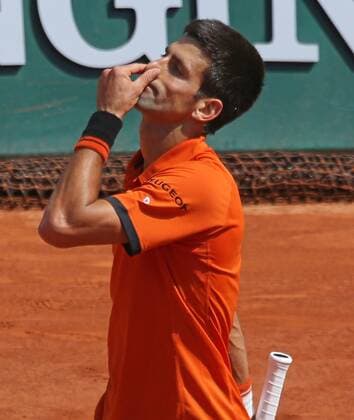Novak Djokovic of Serbia reacts after a shot during his French Open men s final match against Stan Wawrinka of Switzerland at Roland Garros in Paris on June 7, 2015.  PAR20150607704 DAVIDxSILPA